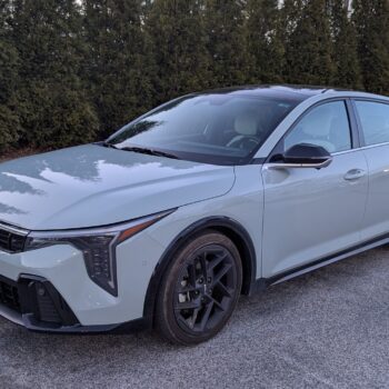 Sleek 2025 Kia K4 GT Line sedan with black wheels - Image by Paul Zangari