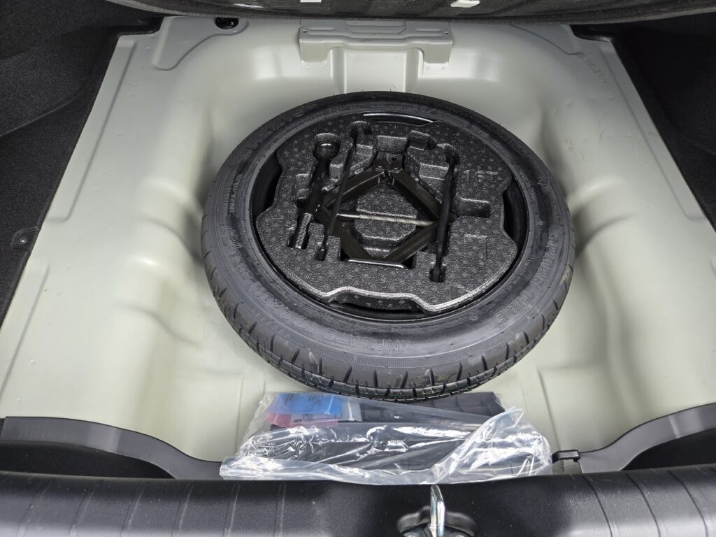 Kia's K4 is one 2025 model that still comes with a standard spare tire.